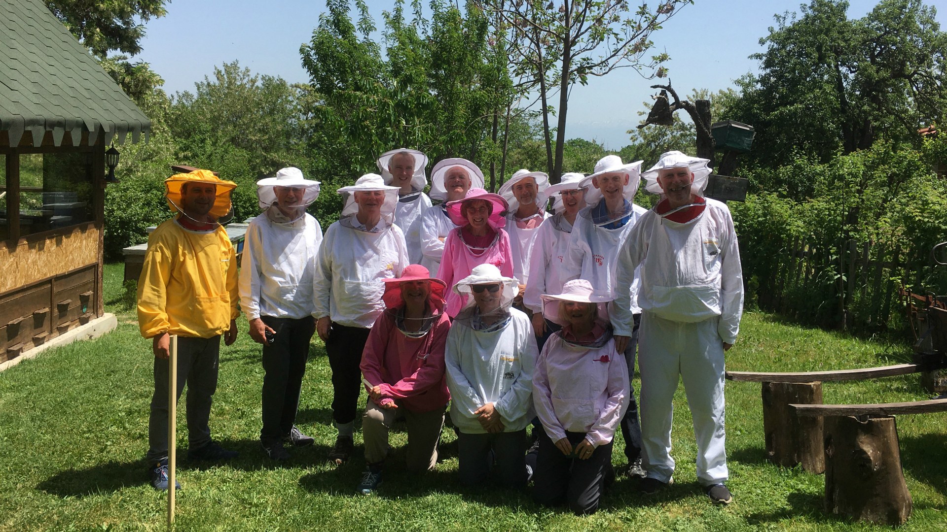 Group in beekeeping outfits, Dihovo, North Macedonia