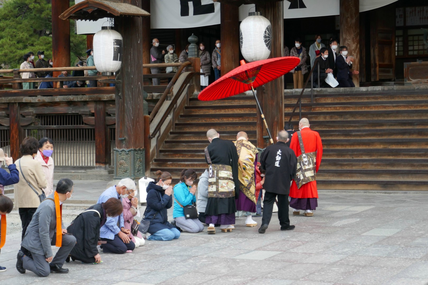 Monk blessing visitors, Zenkoji Temple, Nagano
