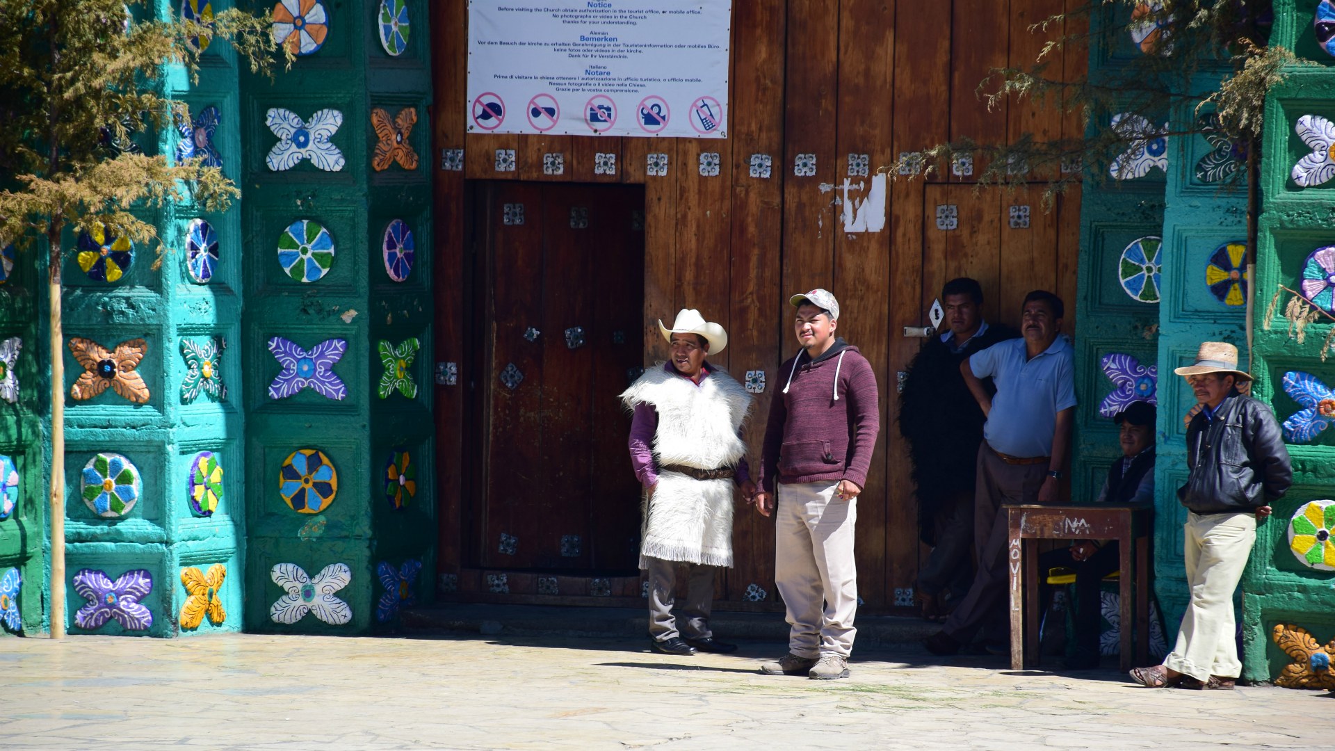 Locals outside Cathedral, San Juan Chamula, Mexico