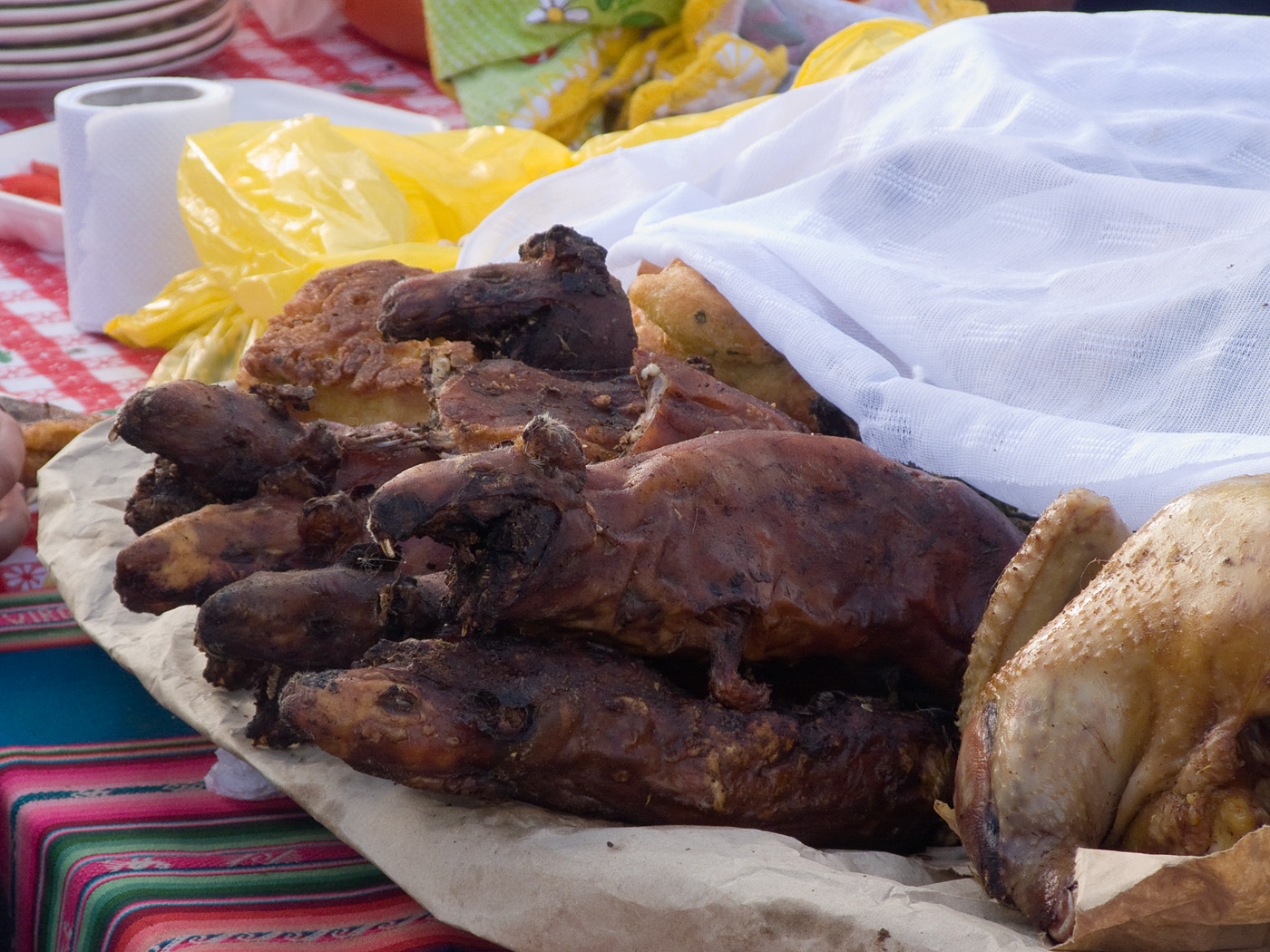 Street stall selling cooked guinea pig, Cusco