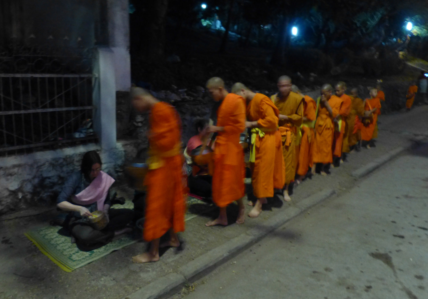 Monks receiving food, Luang Prabang, Laos