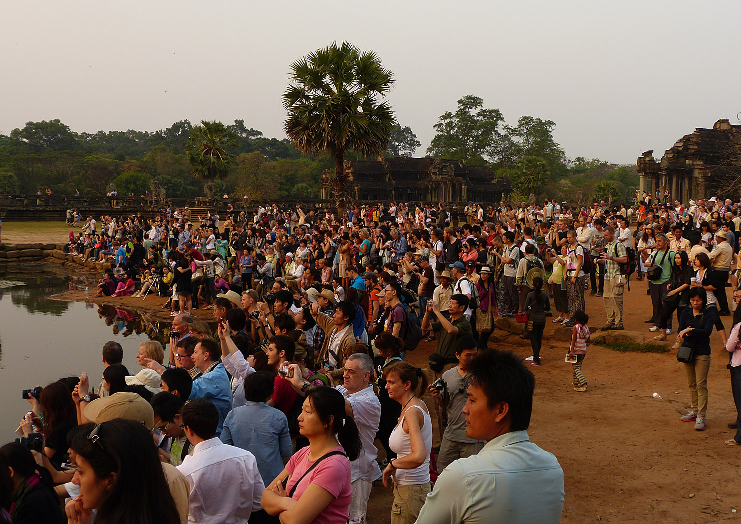 Crowd watching sunrise at Angkor Wat, Cambodia